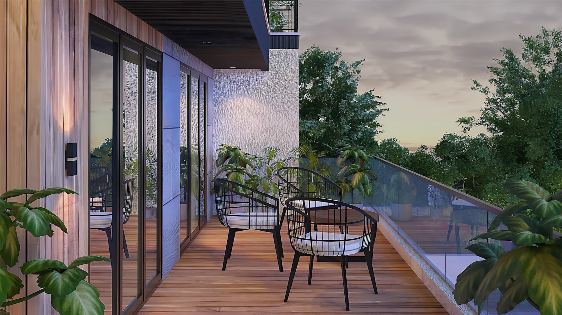 Timber-decked balcony with lounge chairs overlooking trees at dusk