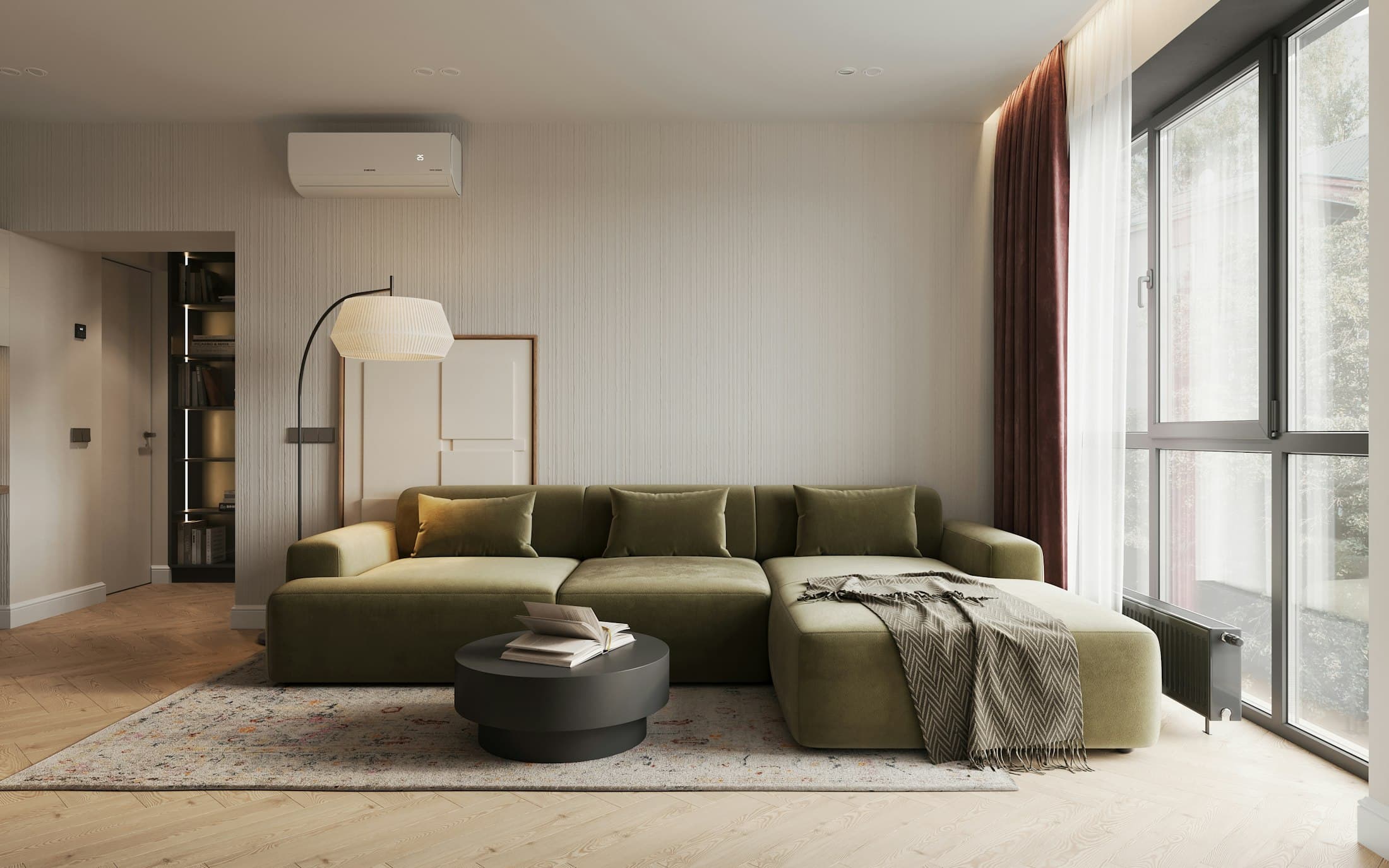 Living room with a sage-green sectional sofa, sculptural floor lamp and full-height curtains